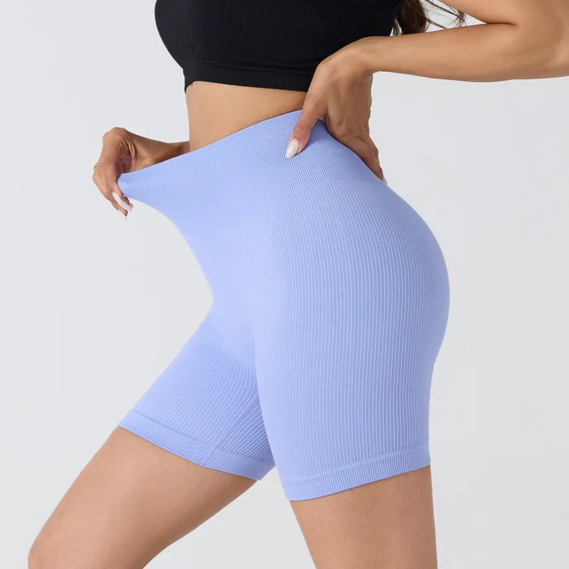 Novo sem costura shorts de yoga hip levantamento cintura alta esportes e fitness três partes calças alta elasticidade apertado encaixe calças de yoga