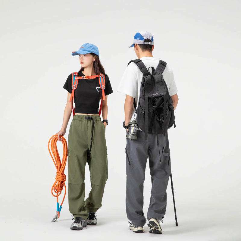 Calças de trabalho ao ar livre com design emendado estilo americano, calças compridas masculinas, calças largas soltas, calças esportivas casuais de perna reta