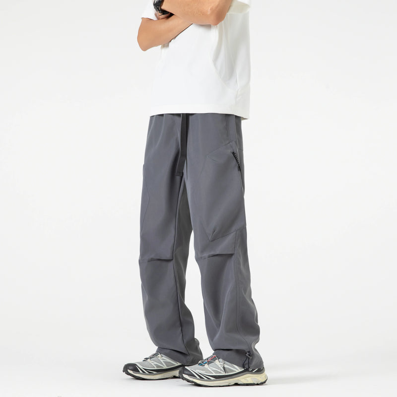 Calças de trabalho ao ar livre com design emendado estilo americano, calças compridas masculinas, calças largas soltas, calças esportivas casuais de perna reta