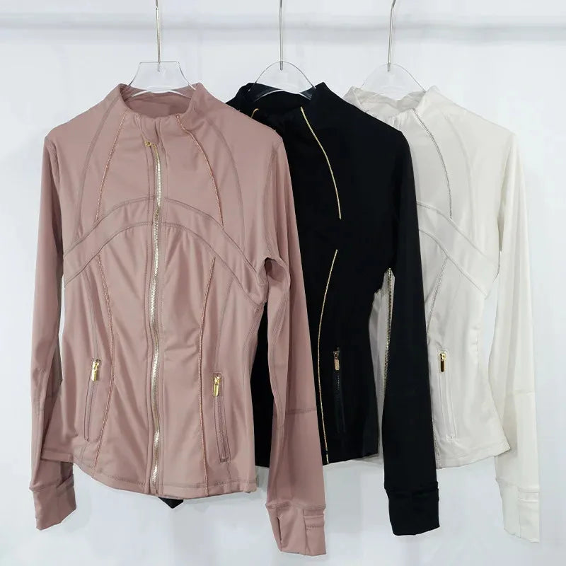 Jaqueta de ioga feminina com zíper dourado |     Cardigan Slim Fit com gola alta |     Bainha antiderrapante e furos para polegares |     Ela alta de secagem rápida