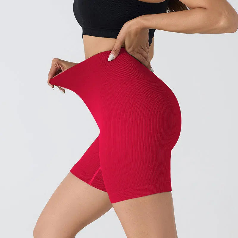 Shorts de ioga de linha sem costura europeus e americanos, calças de ioga de três partes, ajuste justo esportivo sem costura, calças de fitness de cintura alta