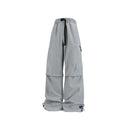 Calças de trabalho ao ar livre com design emendado estilo americano, calças compridas masculinas, calças largas soltas, calças esportivas casuais de perna reta